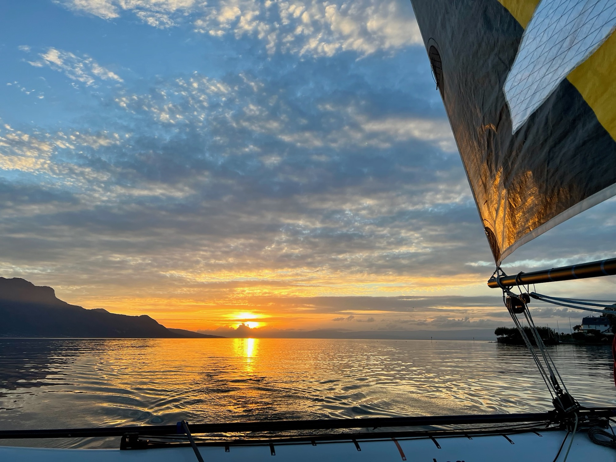 Sunset view from a sailboat on Lake Geneva